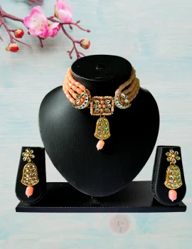 Jewellery set for women with kundan work peach color